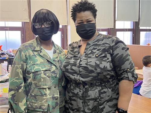Staff wearing Camouflage to honor Vets with masks.